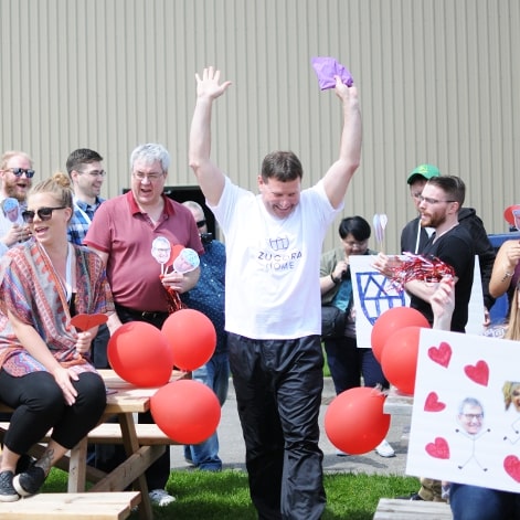 Jim Bower winner of the pie on the face contenst with winner pose.