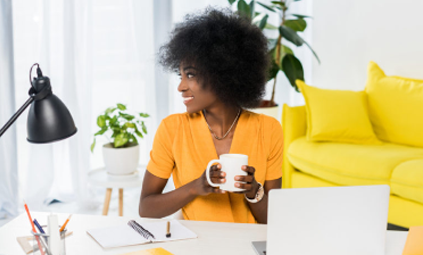 Image of a woman working on laptop.