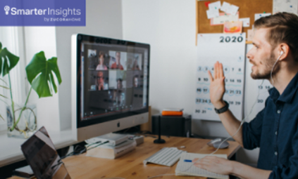 Image of a male attending online meeting on his screen.